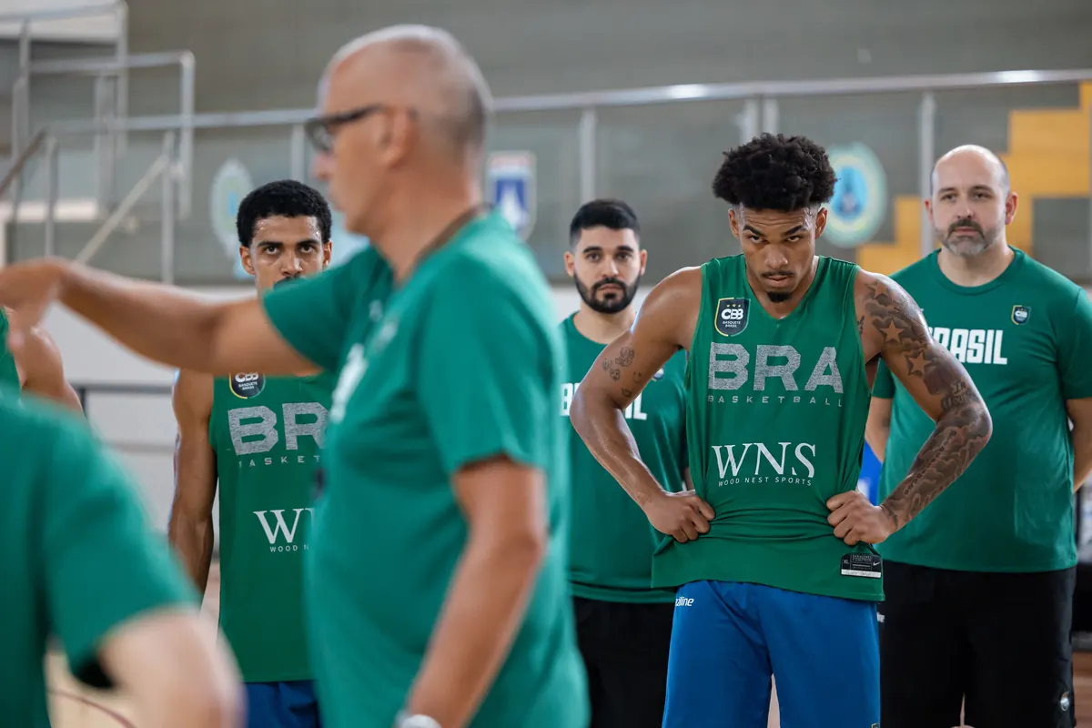 Coach addressing Brazil players during training camp