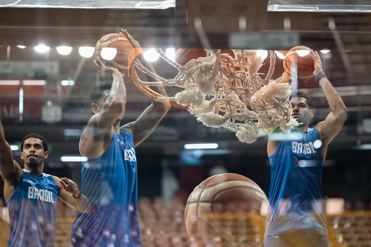 Multiple exposure of Brazil players dunking in practice